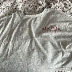 Grey shirt with “New York” printed on it NEVER WORN